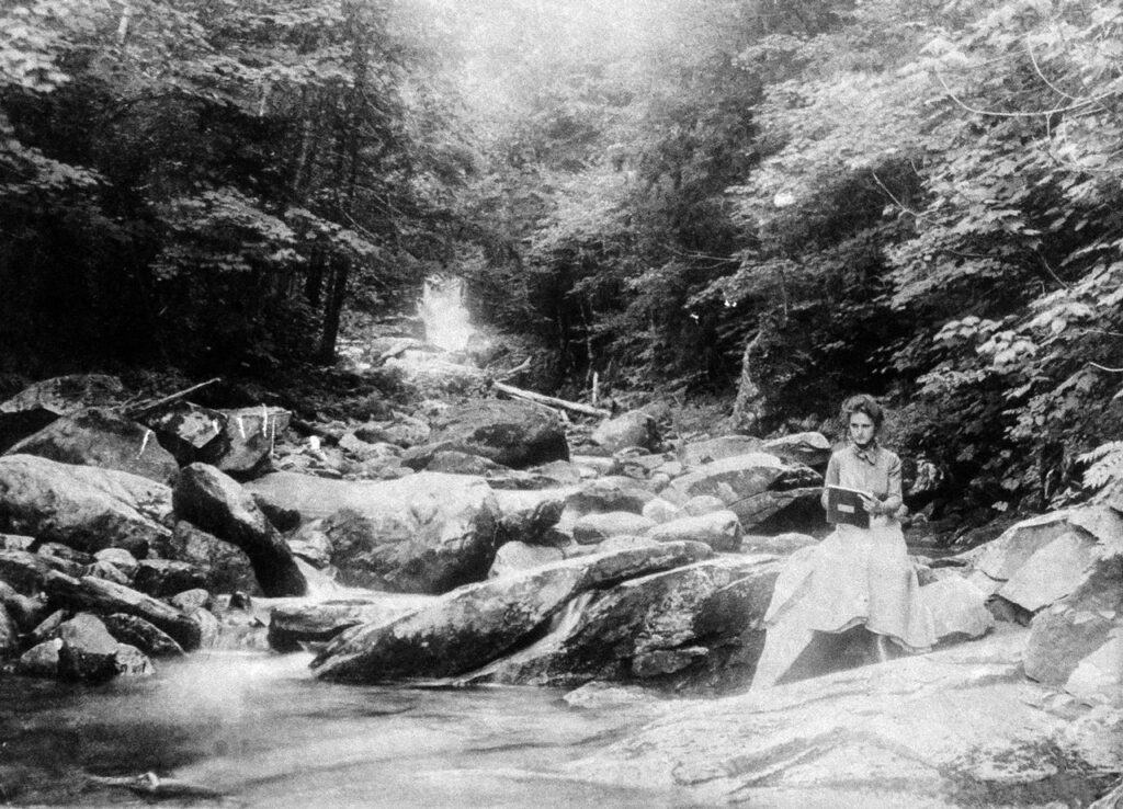 Florence Peek Abbott sketching by a stream. Photo courtesy of Ms. Abbott's great-niece Ginny Folsom Umiker