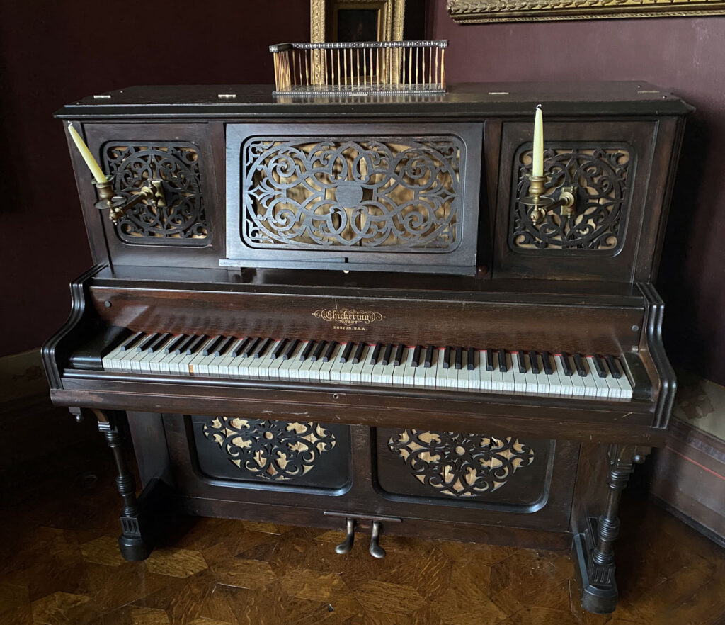 The 1885 Chickering piano in the Olana dining room. Photo by Annik LaFarge, author of Composing Olana