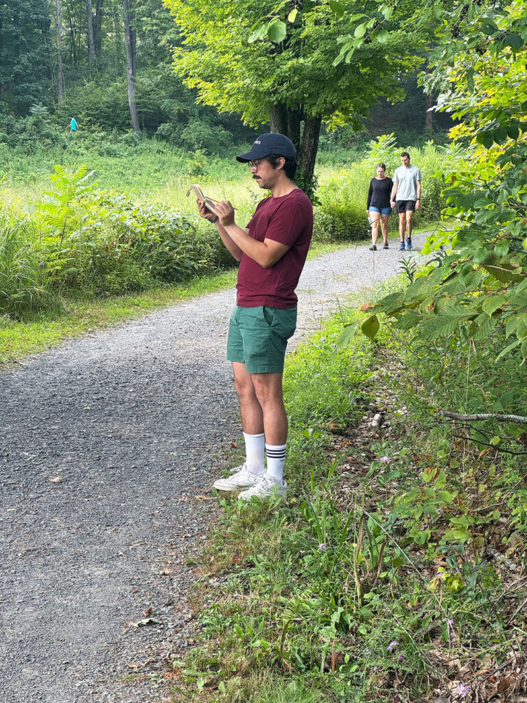 A man sketching en plein air along Ridge Road, August 2025. Photo by Annik LaFarge, author of Composing Olana