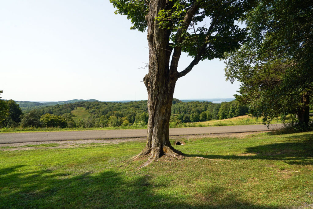 View from the location of Frederic Church's first studio, looking out over Inbocht Bay in the Hudson River, with Crown Hill at left. Photo by Annik LaFarge, author of Composing Olana