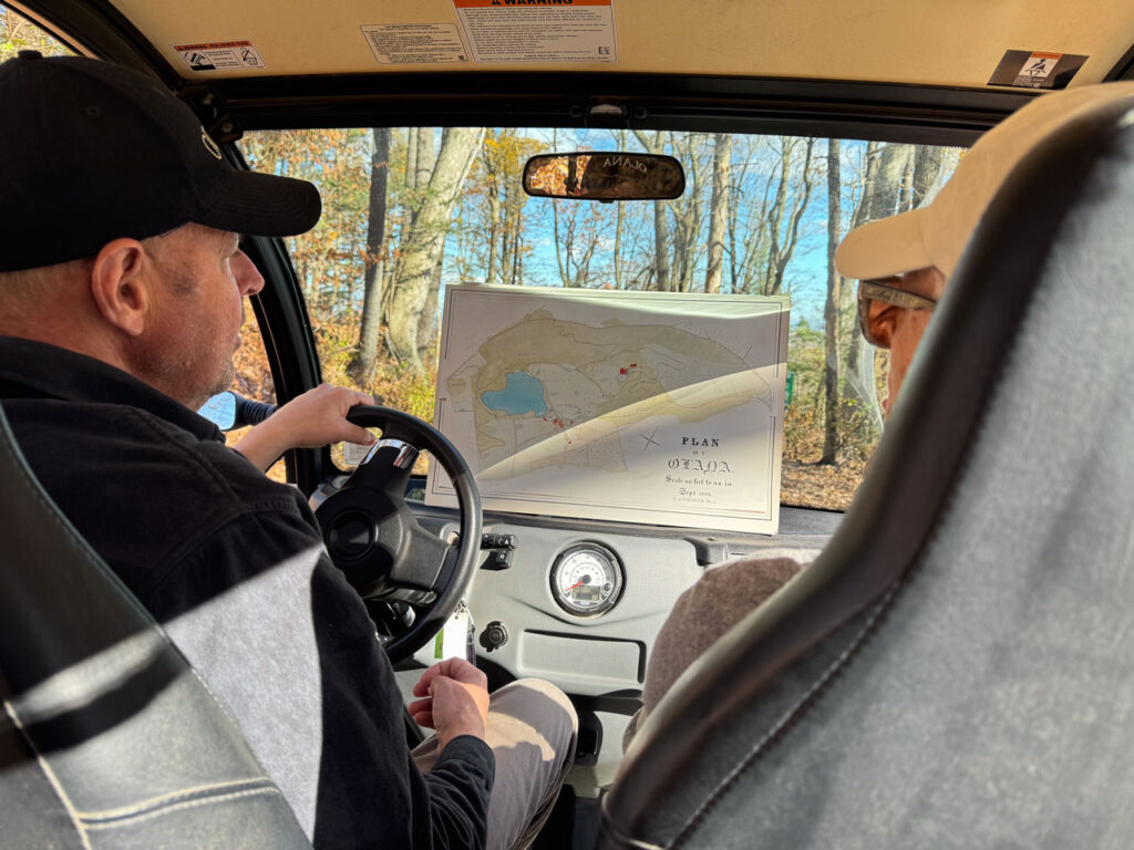 Mark Prezorski pauses an electric vehicle tour along Ridge Road, using the 1886 Plan of Olana to help interpret the landscape. Photo by Annik LaFarge, author of Composing Olana