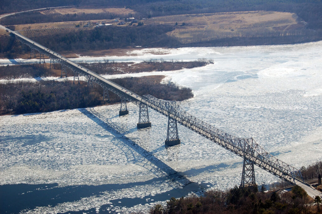 An aerial view, looking southeast, of the Rip Van Winkle Bridge passing over Rogers Island. Photo: courtesy NYS Bridge Authority