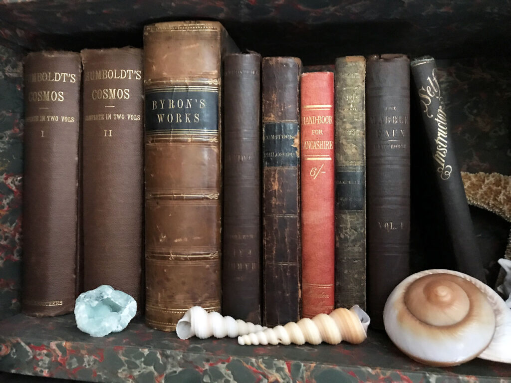 Frederic Church was greatly influenced by Alexander Von Humboldt's 2-volume "Cosmos," as was Thomas Cole. This is a photo of Cole's bookshelf at Cedar Grove. Photo by Annik LaFarge, author of Composing Olana