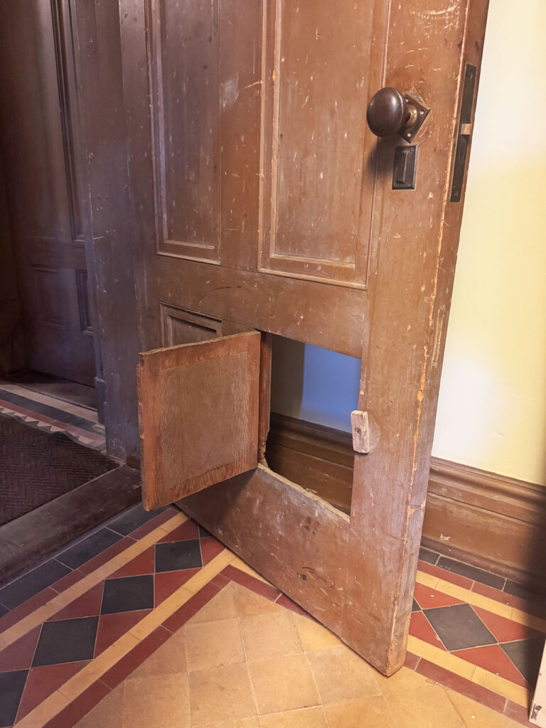 The Church family loved dogs, and Louis Church fashioned a special door to give his pup easy access to the apartment on the ground floor. Photo by Annik LaFarge, author of Composing Olana
