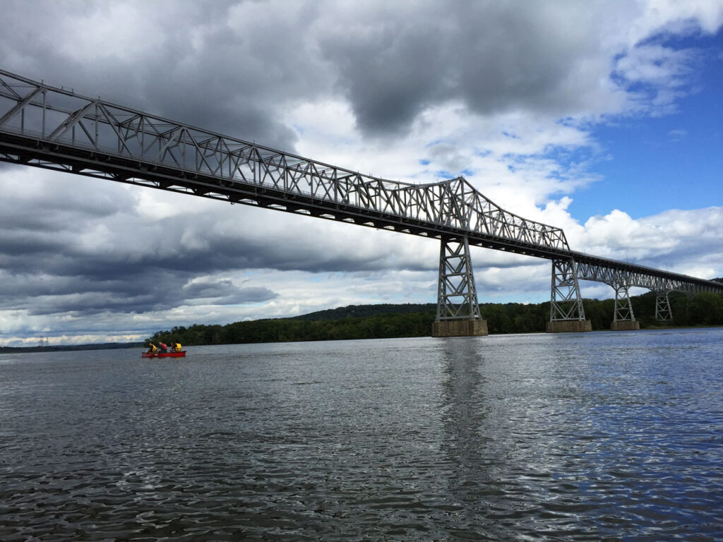 Kayaker's view of Mt. Merino, looking north past the Rip Van Winkle Bridge, August 2015. Photo by Annik LaFarge, author of Composing Olana