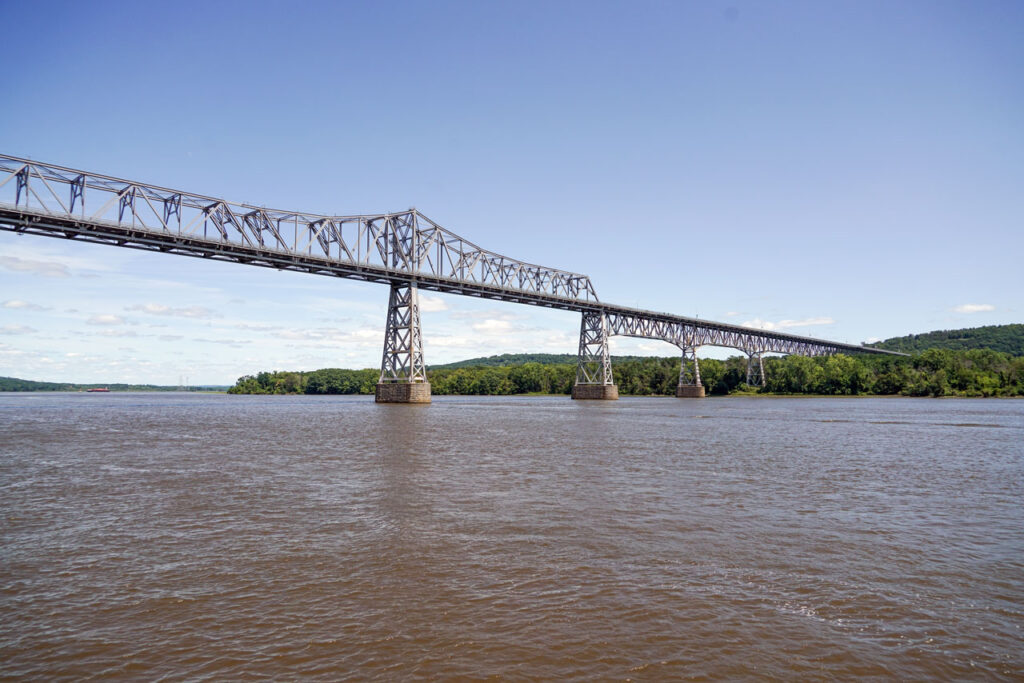 Kayaker's view of the Rip Van Winkle Bridge, looking northeast, July 2021. Photo by Annik LaFarge, author of Composing Olana