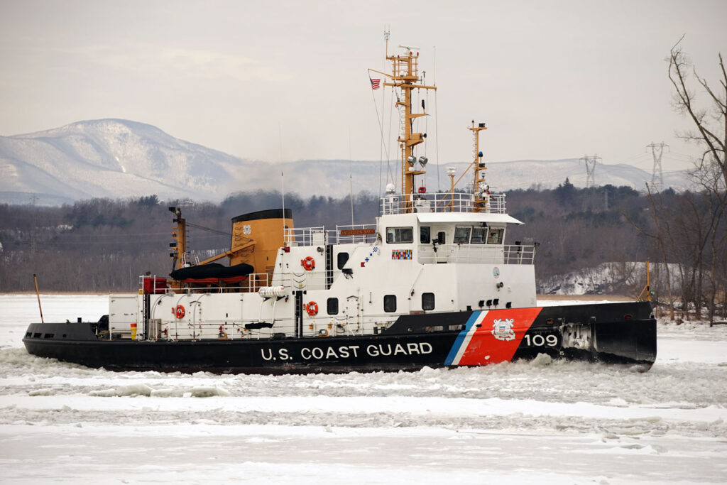 The mighty Coast Guard ice cutter Sturgeon Bay clears a path in the river, February 2015. Photo by Annik LaFarge, author of Composing Olana